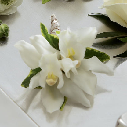 White Mini Cymbidium Boutonniere –  Usa Flowershop Llc, Pompano Beach FL